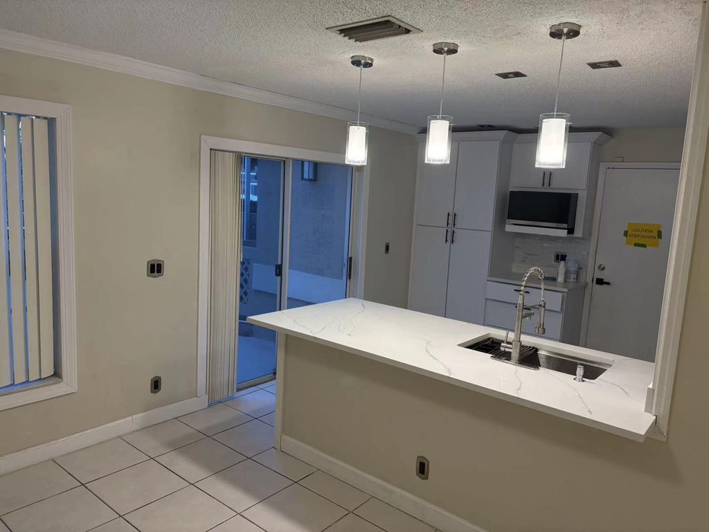 Photo of 11077 Longboat Drive, Cooper City, FL 33026 (MLS # B26004945)