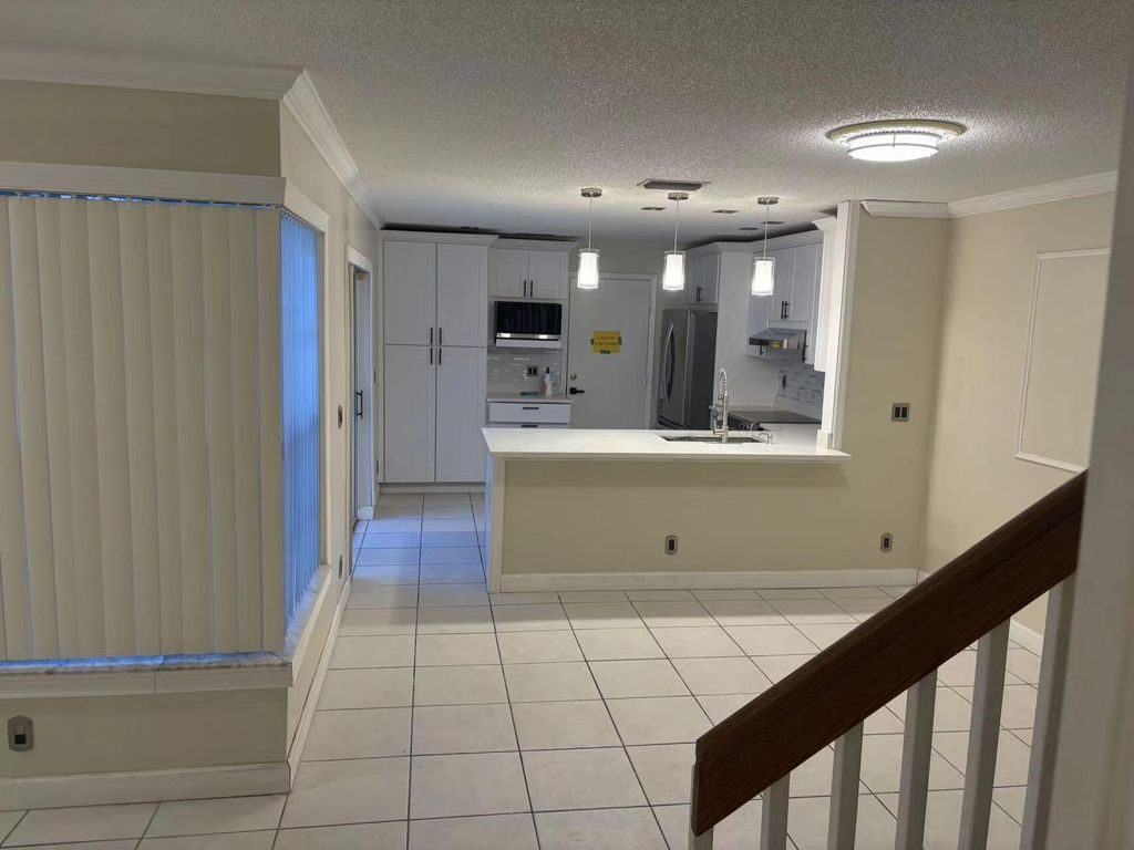 Photo of 11077 Longboat Drive, Cooper City, FL 33026 (MLS # B26004945)