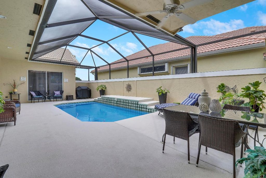 Photo of 719 SW Aruba Bay, Port Saint Lucie, FL 34986 (MLS # R10996741)