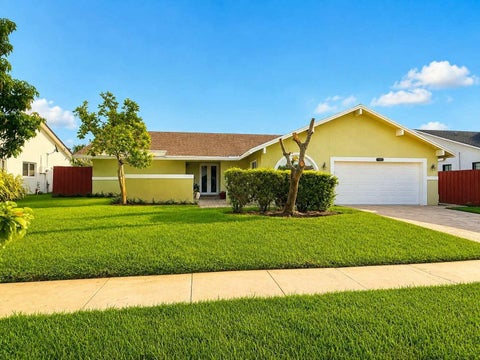 Photo of 7482 NW 48TH Place, Lauderhill, FL 33319 (MLS # B26074532)