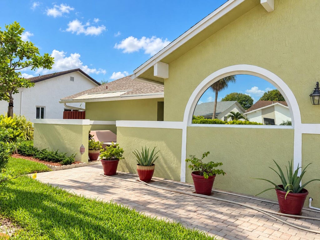 Photo of 7482 NW 48TH Place, Lauderhill, FL 33319 (MLS # B26074532)