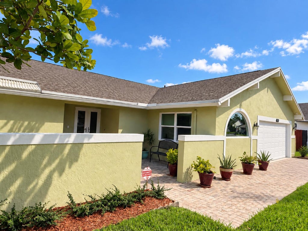 Photo of 7482 NW 48TH Place, Lauderhill, FL 33319 (MLS # B26074532)