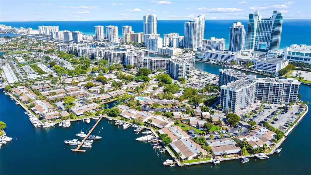 THIS IS SUCH A GREAT LARGE SINGLE STORY VILLA ON THE WATER WITH A DEEDED DOCK THAT CAN FIT A BOAT OF 26 FEET WITH OCEAN ACCESS. ROOF IS NEW. ENJOY THE OPEN FLOOR PLAN THAT CAN BE TURNED INTO A 3 BEDROOM IF NEEDED. WALK OUT ONTO YOUR COVERED PATIO DIRECTLY ON THE WATER AND JUST RELAX WHILE READING A BOOK, BBQ'S, OR TO ENTERTAIN. WALK ALONG THE WATER TO FIND THE COMMUNITY POOL OR WALK TO THE TENNIS COURT. THE LOCATION OF HARBOURWOOD VILLAS IS UNBEATABLE BEING JUST MINUTES FROM GULFSTREAM RACETRACK AND CASINO, LESS THAN A MILE FROM THE BEACHES, AND VERY CLOSE TO FINE DINING AND GREAT ENTERTAINMENT. WASHER AND DRYER IN THE VILLA. TWO PARKING SPOTS WITH GUEST PARKING THROUGHOUT.