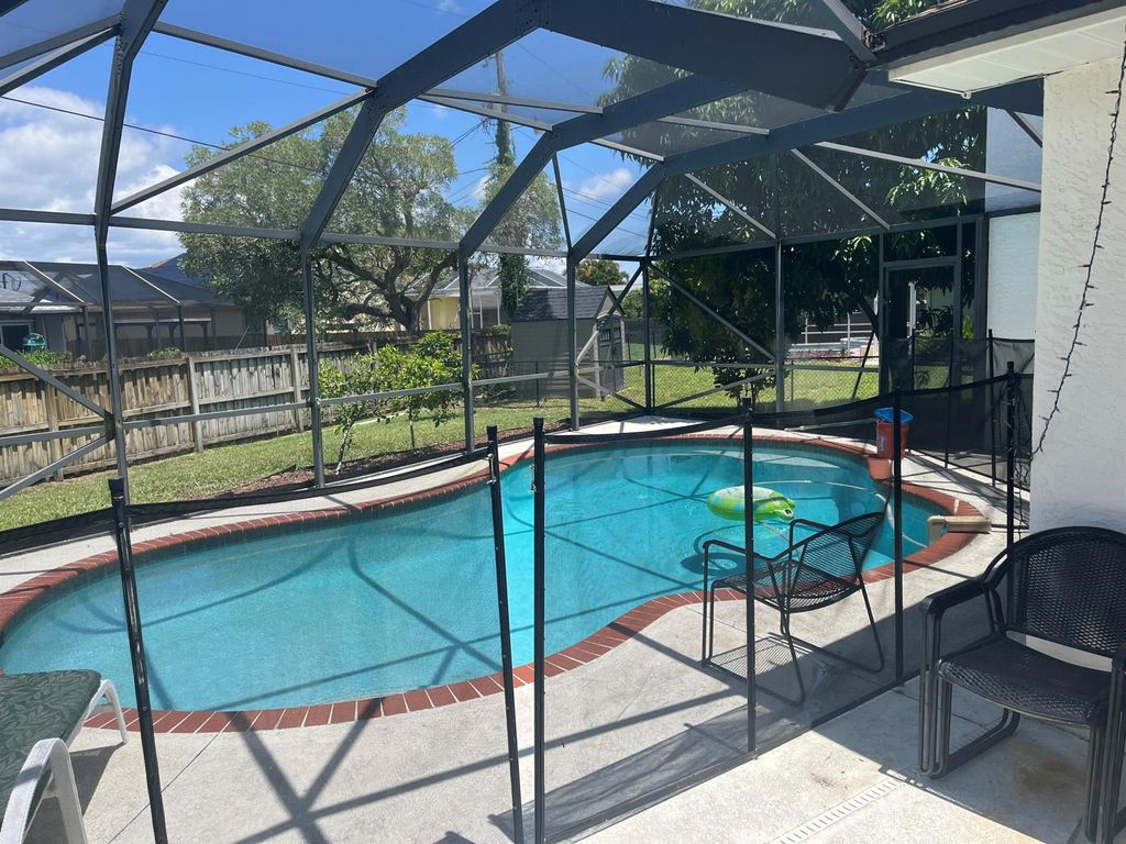 Photo of 4605 NW Gastonia Street, Port Saint Lucie, FL 34983 (MLS # R10994060)