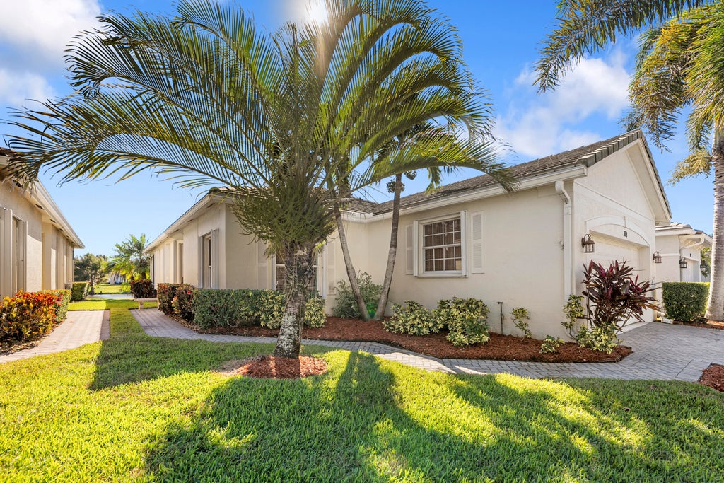 Photo of 319 SW Maclay Way SW, Port Saint Lucie, FL 34986 (MLS # R11036547)