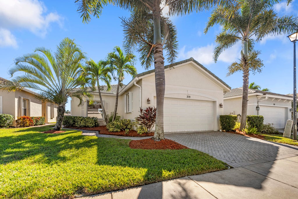 Photo of 319 SW Maclay Way SW, Port Saint Lucie, FL 34986 (MLS # R11036547)