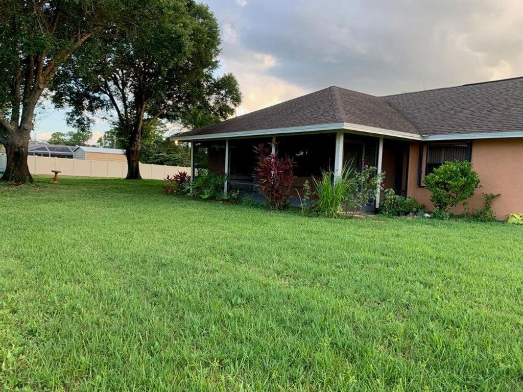 Photo of 1001 SW Curtis Street, Port Saint Lucie, FL 34983 (MLS # R11112742)