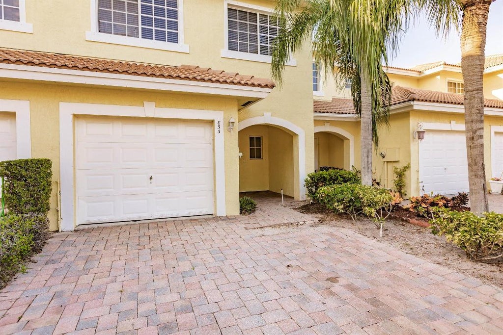 Photo of 853 Imperial Lake Road, West Palm Beach, FL 33413 (MLS # R11138569)