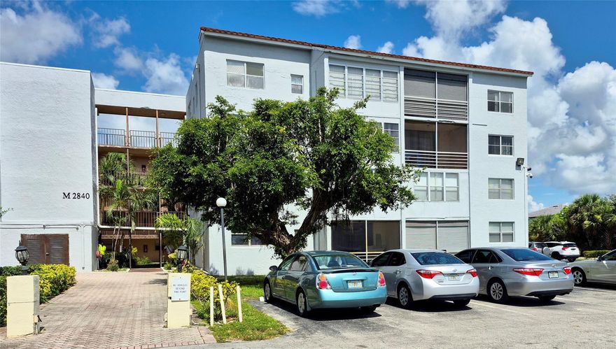 Motivated seller—submit your best offer today! This impeccably kept 2-bedroom, 2-bath condo in the sought-after 55+ Somerset community at Lauderdale Lakes stands out as one of the most attractively priced options available. Perched on a higher floor for elevated views and added privacy, it boasts an open split-bedroom floor plan, durable tile flooring throughout, updated central air conditioning, and a bright, airy feel. Spotless and truly move-in ready, this gem is nestled in a secure gated enclave with ample guest parking, 24/7 security, and prime proximity to highways, shopping centers, dining, and medical facilities—delivering unbeatable value in a vibrant adult community.