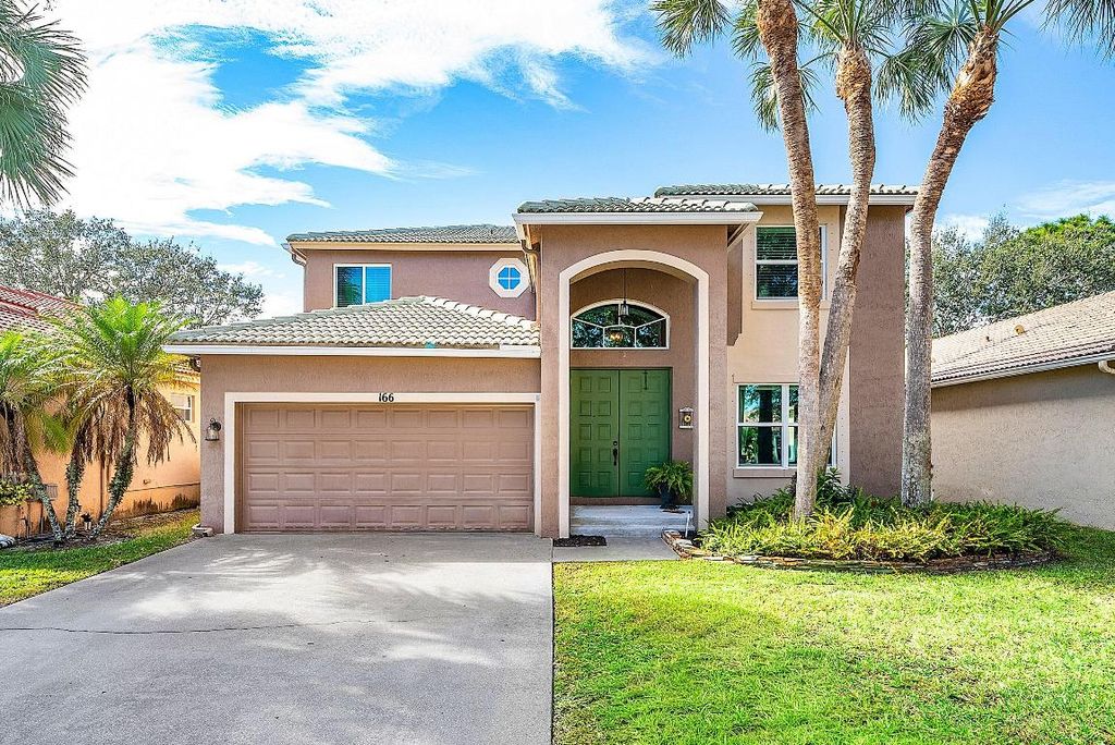 Photo of 166 Seminole Lakes Drive, Royal Palm Beach, FL 33411 (MLS # R11151207)