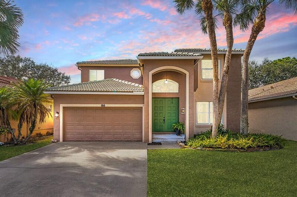 Photo of 166 Seminole Lakes Drive, Royal Palm Beach, FL 33411 (MLS # R11151207)