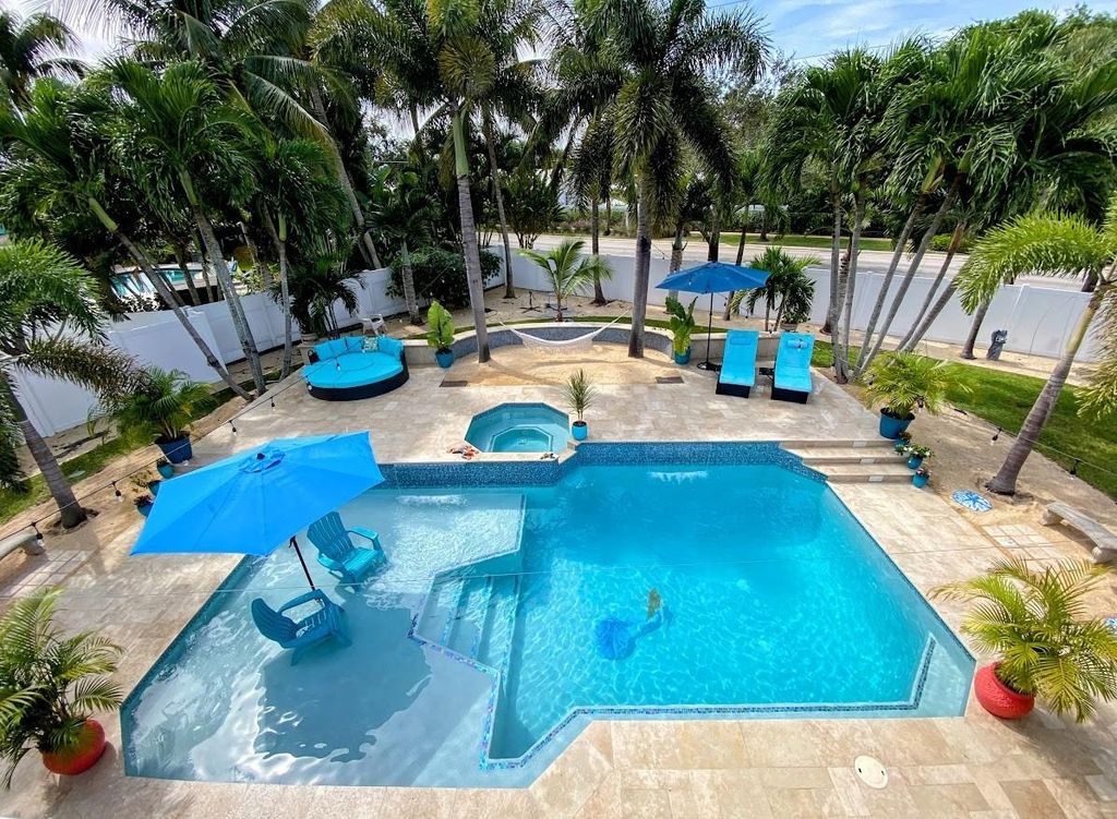 Photo of 89 Teakwood Circle, Tequesta, FL 33469 (MLS # F10410807)