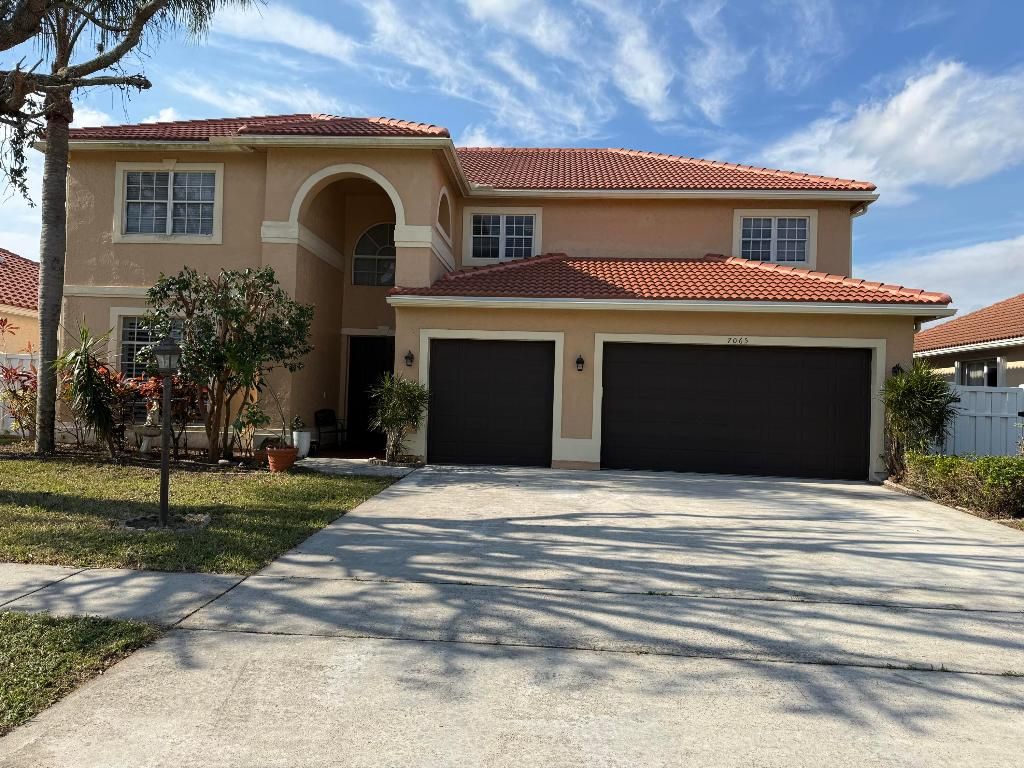 Photo of 7065 Catalina Isle Dr, Lake Worth, FL 33467 (MLS # R11147935)