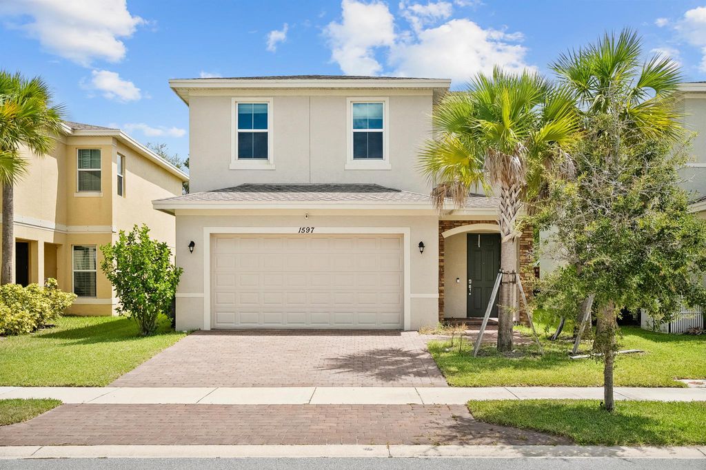 Photo of 1597 NW Cataluna Circle, Port St Lucie, FL 34986 (MLS # R11113997)