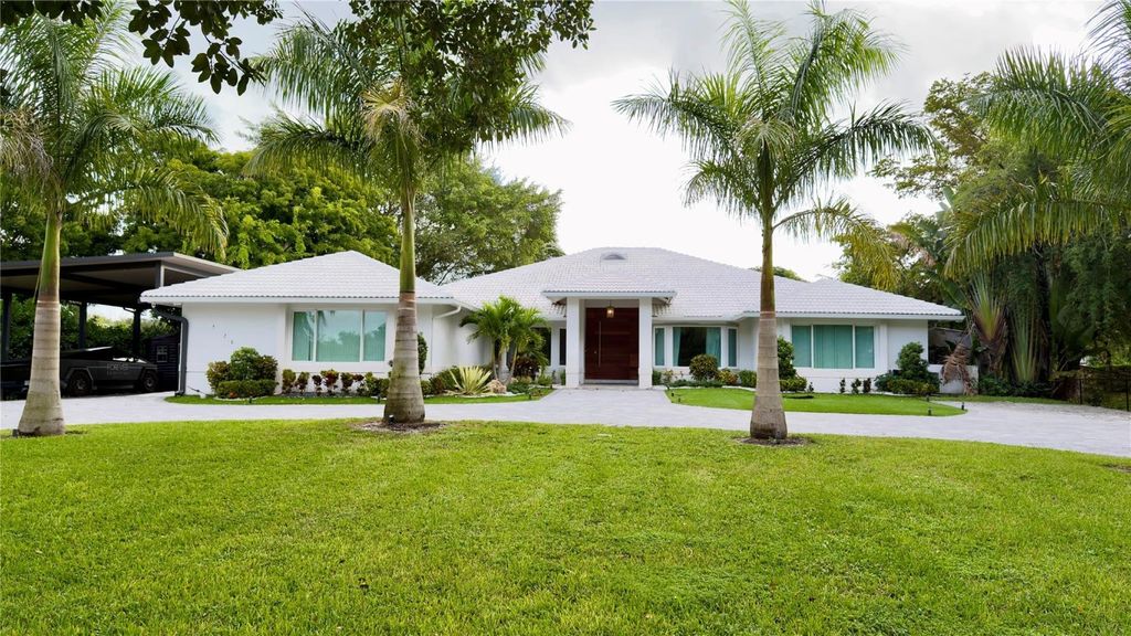 Photo of 5928 NW 77th Terrace, Parkland, FL 33067 (MLS # F10529989)