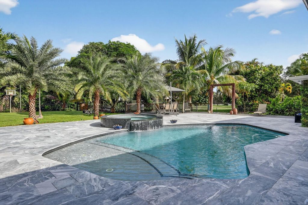 Photo of 5928 NW 77th Ter, Parkland, FL 33067 (MLS # F10529989)