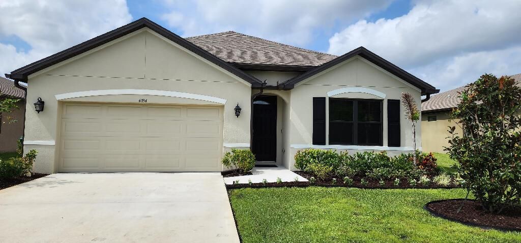 Photo of 6354 NW Regent Street, Port Saint Lucie, FL 34983 (MLS # R10926668)