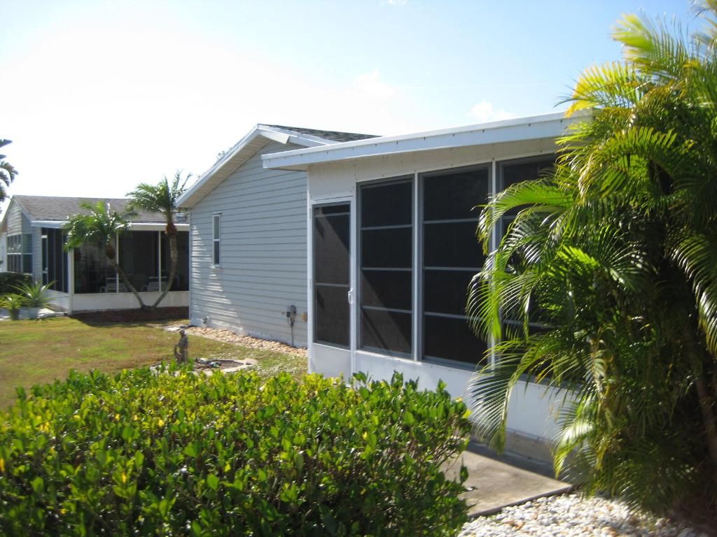 Photo of 7928 Meadowlark Lane, Port Saint Lucie, FL 34952 (MLS # R11150811)