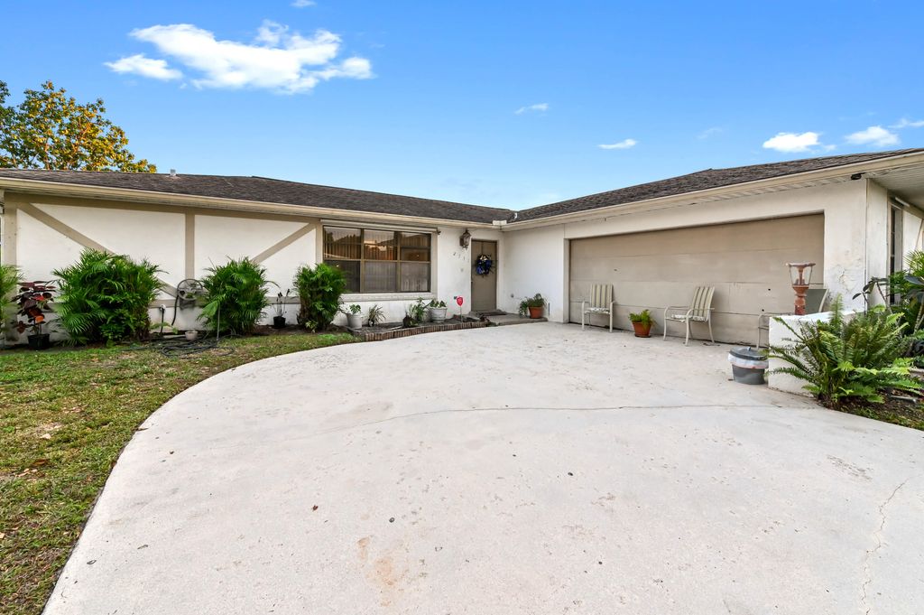 Photo of 2531 Doral Way, Riviera Beach, FL 33407 (MLS # R11155156)