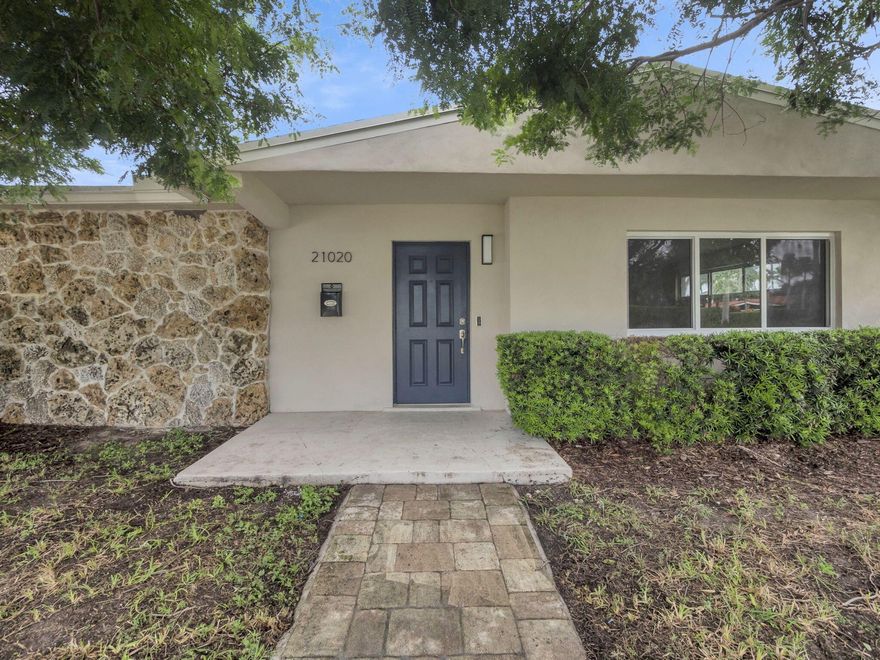 Welcome to your dream home in the heart of Highland Lakes! This beautifully updated 4-bedroom, 3-bathroom residence offers over 2,000 sq ft of spacious living on an oversized 8,000+ sq ft lot. Featuring impact windows and doors, this solid concrete-block home blends style and security. The layout includes a modern kitchen with stainless steel appliances, updated bathrooms, large living and dining areas, plus a bonus family room perfect for entertaining. Step outside to a covered patio and private backyard oasis with room for a pool. Nestled in a quiet, guard-gated community with no HOA and zoned for top-rated schools. Just minutes from Aventura Mall, I-95, houses of worship, and Sunny Isles Beach. Don't miss this rare opportunity in one of North Miami-Dade's most sought-after neighborhood