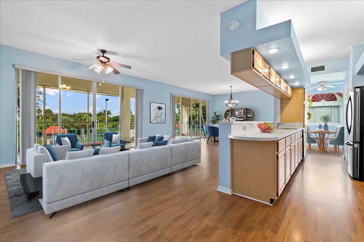Seller concessions available! This is the lowest-priced 3-bedroom unit in the highly sought-after Half Moon Bay community in Hypoluxo, FL. Move right in with equity in your pocket!This rarely available second-floor 3 bed, 2 bath condo features high ceilings, fresh paint, a new AC unit, and newer kitchen appliances (only 3 years old!). Enjoy your morning coffee or unwind in the evening on the expansive screened-in patio. Comes with one assigned parking space plus plenty of guest parking.Live where others vacation! Half Moon Bay is a resort-style, all-ages, pet-friendly Intracoastal-front community offering two heated pools, a BBQ area, a clubhouse with a game room & library, tennis & pickleball courts, and a private gazebo with breathtaking water views.