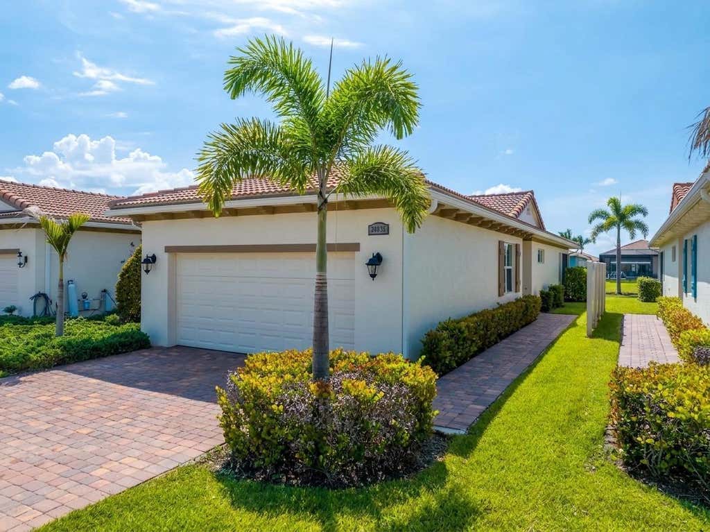 Photo of 24035 SW FIRENZE Way, Port Saint Lucie, FL 34986 (MLS # B26064125)