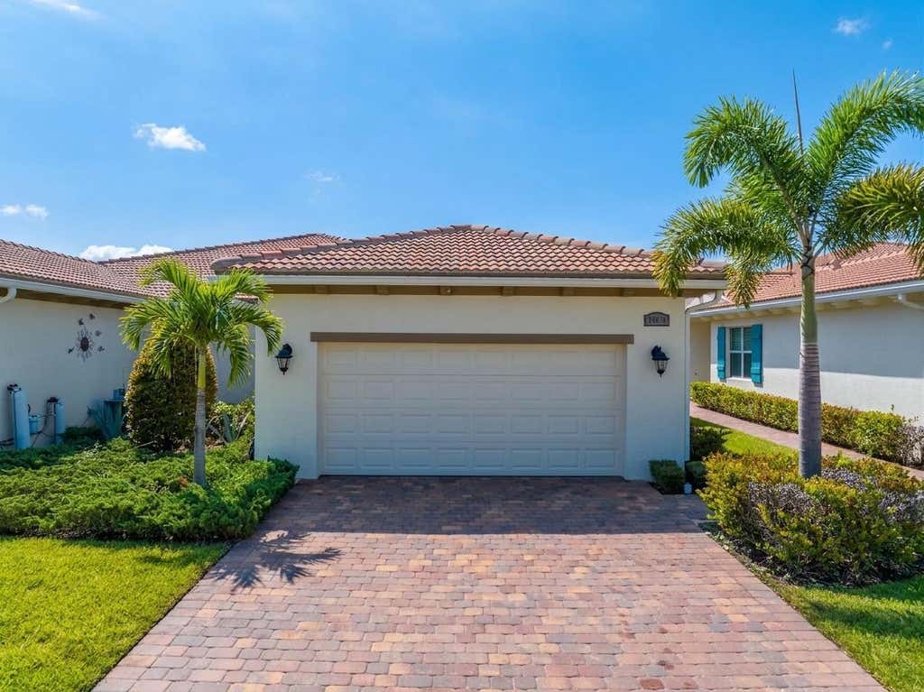 Photo of 24035 SW FIRENZE Way, Port Saint Lucie, FL 34986 (MLS # B26064125)