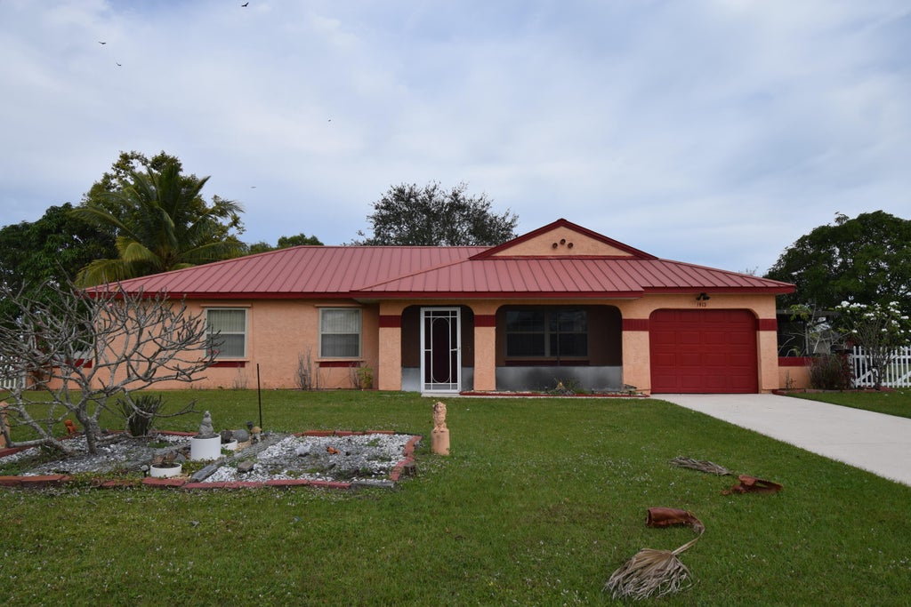 Photo of 1913 SE West Dunbrooke Circle, Port Saint Lucie, FL 34952 (MLS # R10939219)