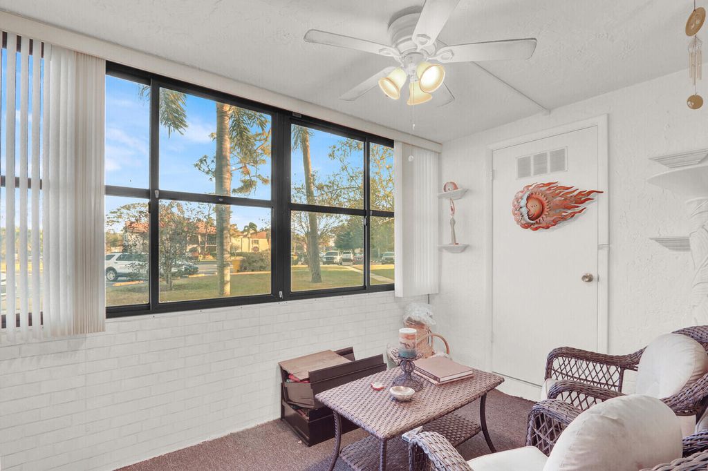 Photo of 309 Knotty Pine Circle #A-1, Greenacres, FL 33463 (MLS # R11164279)