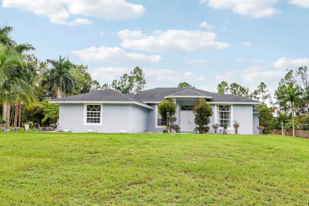 Photo of 15820 92nd Court N, West Palm Beach, FL 33412 (MLS # R11124650)