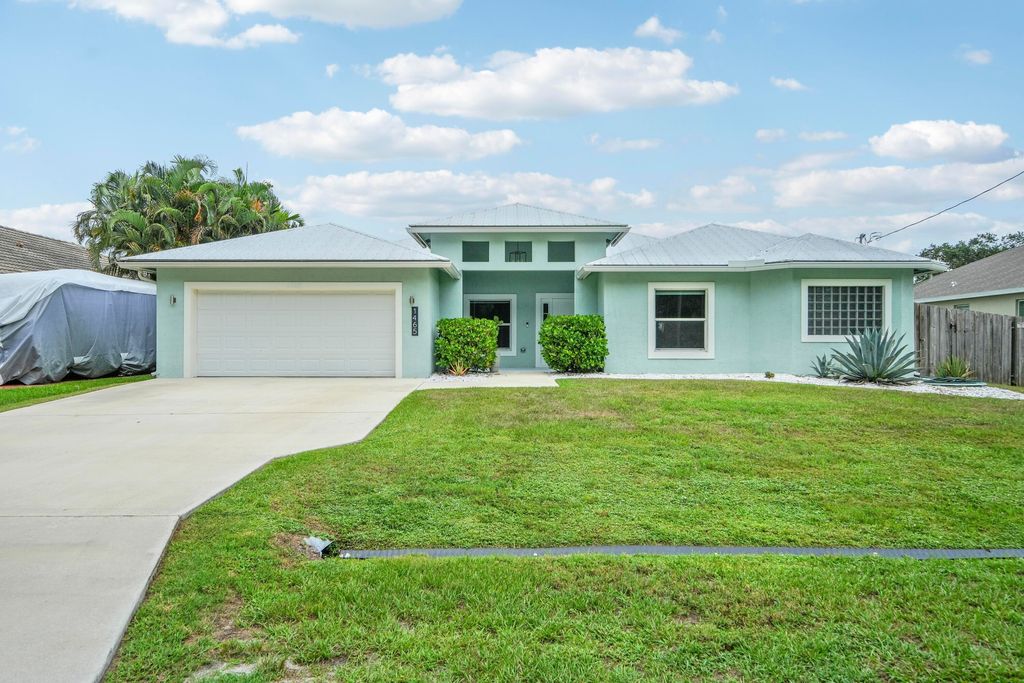 Photo of 1465 SW Edinburgh Drive, Port Saint Lucie, FL 34953 (MLS # R11122096)