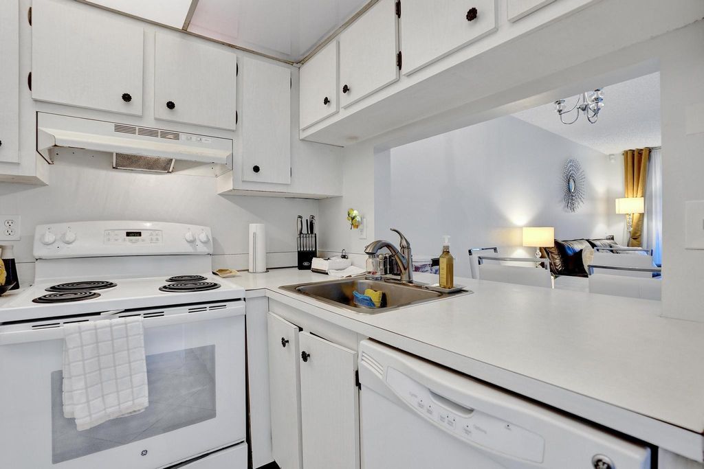 Photo of 9480 Poinciana Place #304, Davie, FL 33324 (MLS # B26007944)