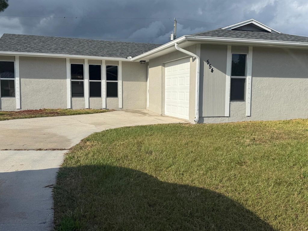 Photo of 554 NW Twylite Terrace, Port Saint Lucie, FL 34983 (MLS # R11147918)