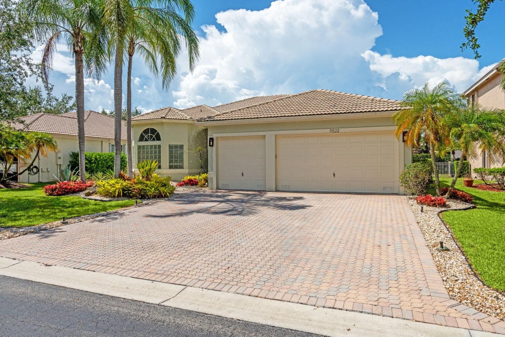 Photo of 11522 NW 51st Place, Coral Springs, FL 33076 (MLS # F10511890)