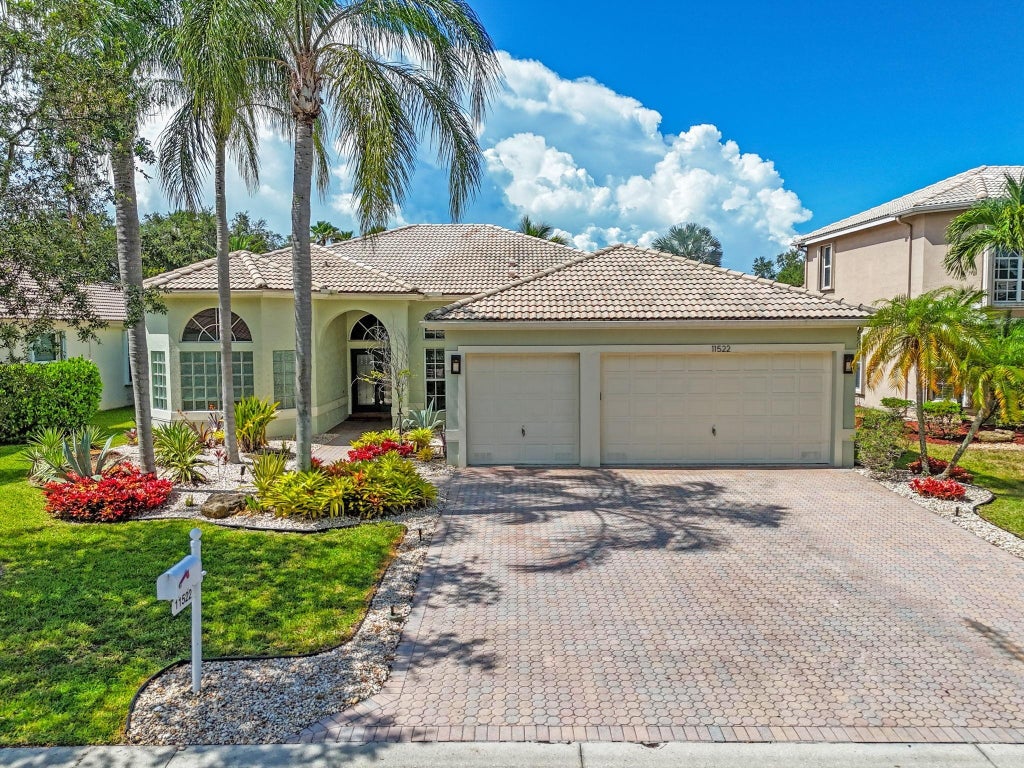 Photo of 11522 NW 51st Place, Coral Springs, FL 33076 (MLS # F10511890)
