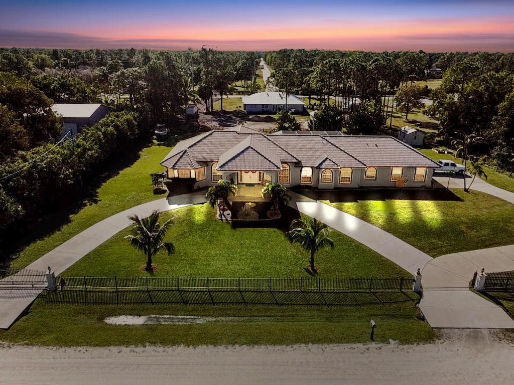 Photo of 18566 40th Run N, Loxahatchee, FL 33470 (MLS # R10948216)