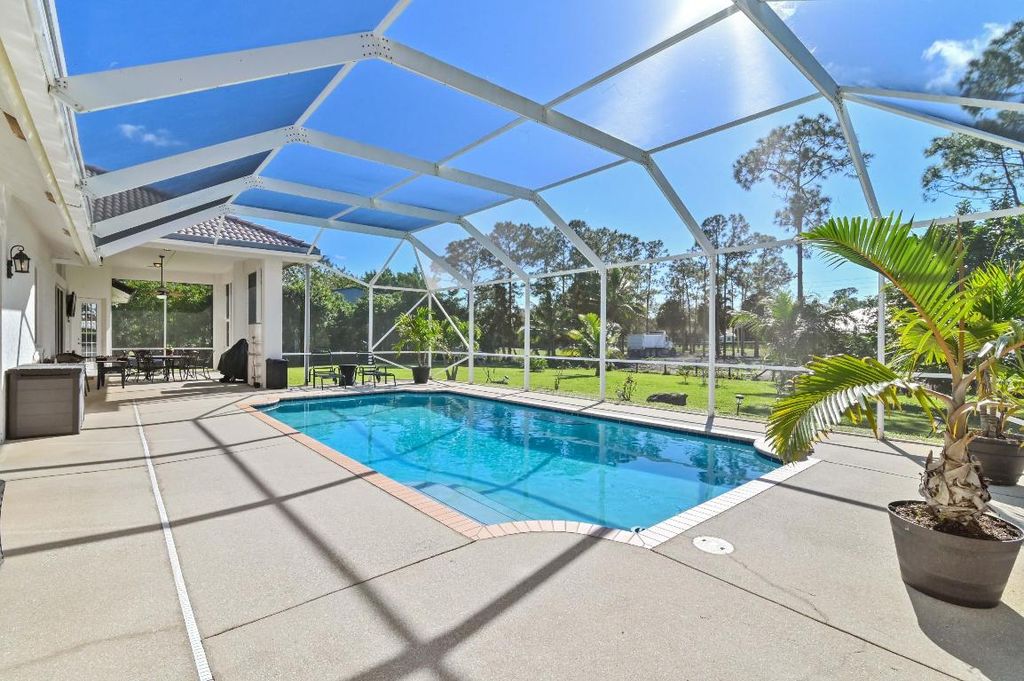 Photo of 18566 40th Run N, Loxahatchee, FL 33470 (MLS # R10948216)