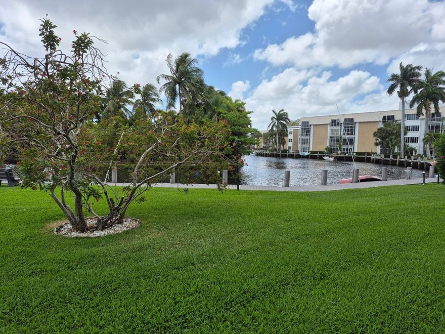 Tranquil water and lawn view on the river. Lovely boardwalk for walking. Dockage available . condo is remodeled and convenient ground floor location with easy access to parking. Put your kayak in and off you go. The complex offers, tennis, lovely heated pool, clubhouse with kitchen. Gated entry. close to bank, shopping mall, grocery. Minutes to the beach and west to 95 for access to Miami or Boca .all windows replaced to high impact and rolladen rain shutters. 50 year inspection completed . cheerful, bright unit a pleasant environment with 2 other condo complexes, Laundry rooms on 3 floors and storage unit .