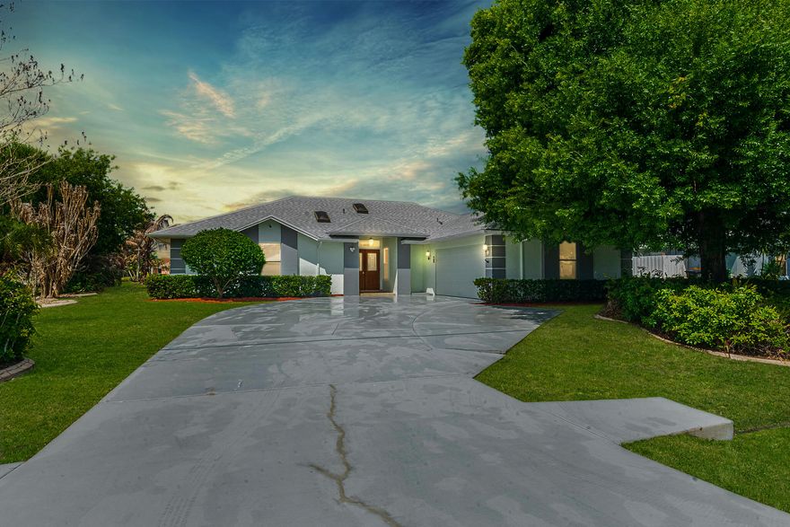 Move-in-ready,3/2/2 home is perfectly situated on a spacious .24-acre corner lot in the desirable Torino/St. James area. The interior features a split-bedroom layout for maximum privacy, enhanced by durable laminate and ceramic tile flooring throughout. A large eat-in kitchen with granitet counters and plenty of cabinetry  wioth an open living area provide a functional space for modern living. Outside, enjoy a private, screen-enclosed 30x15 pool and covered patio. Notable upgrades include a new roof installed in 2024, a tankless electric water heater, and a  generator hook up for peace of mind. Fresh paint in/out comfort and efficiency without the restrictions of an HOA. Close to shopping and dining, this gem is easy to show and ready for its new owner