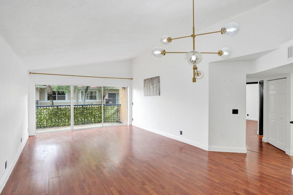 Photo of 8761 Wiles Road #301, Coral Springs, FL 33067 (MLS # B26080779)