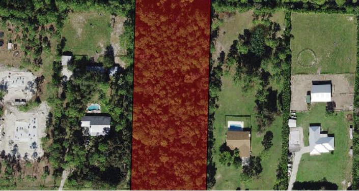2.69 Acres in Jupiter Farms. New homes built around property. Lot is heavily wooded and high and dry. Soil borings complete and reports available upon request. Zoned for single family home. Great property for horses. No thru traffic