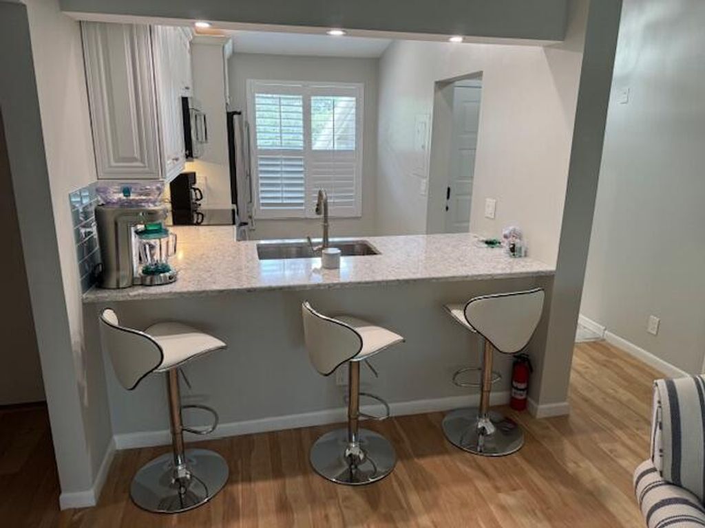 Photo of 6928 Briarlake Circle #202, Palm Beach Gardens, FL 33418 (MLS # R11123934)