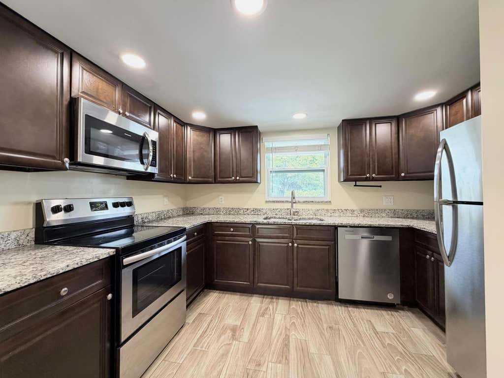 Photo of 3794 SE County Line Road #102, Jupiter, FL 33469 (MLS # B26061379)