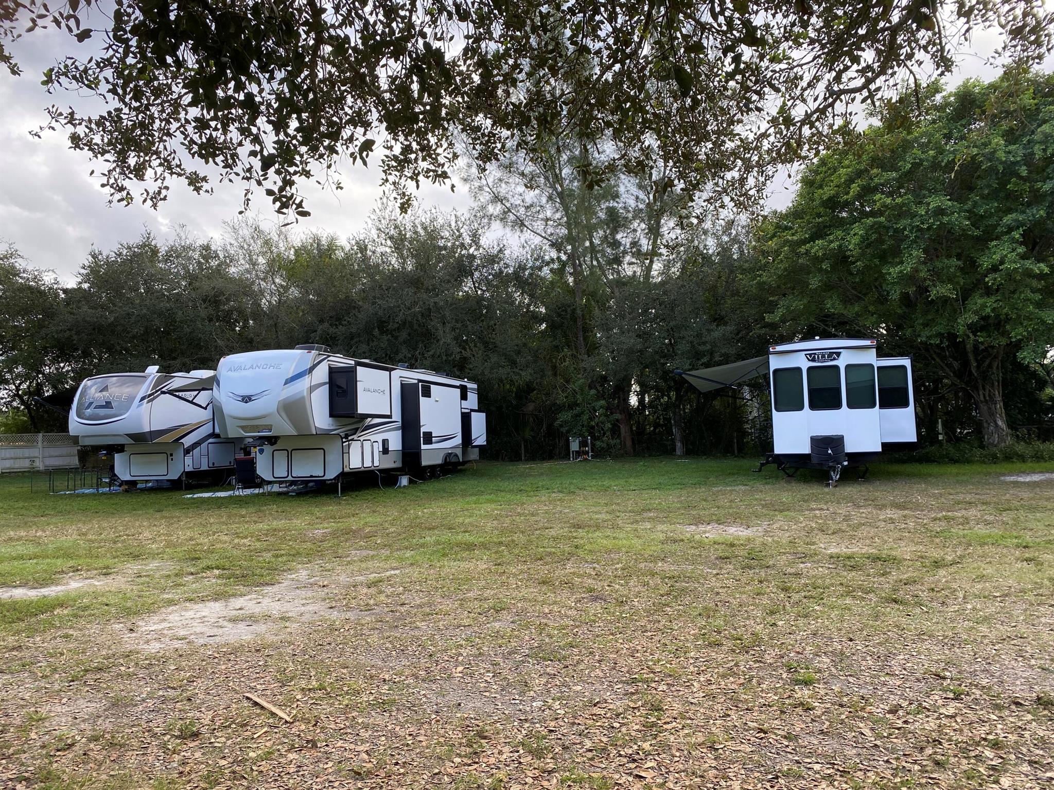 Equestrian delight! Seasonal/Annual. Rent a spot & bring your RV. Live w/your horse on 14 Ac farm on B Rd in Loxahatchee Groves, moments from PBIEC/WEF!  (Options for partial board/dry stalls). Features: Covered warm-up arena-20mx40m GGT footing + a separate XLg all-purpose arena w/non-flooding bouncy screening sand/clay w/flat grass footing + trails & shaded paddocks. Enjoy this peaceful private oasis:  includes shared use of laundry facility, water & electricity for 30 amp service. Tenant responsible for blackwater service. Hotspot recommended for Wifi. Private gate to enter farm, park by entrance. No smoking on premises. An animal sanctuary-no guests allowed. Pets considered on case-by-case basis. Harmonize w/your horse, Owner is an animal psychic.