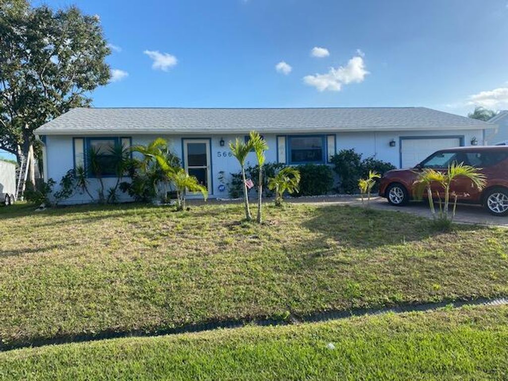 Photo of 566 SW Butler Avenue, Port Saint Lucie, FL 34983 (MLS # R10782611)