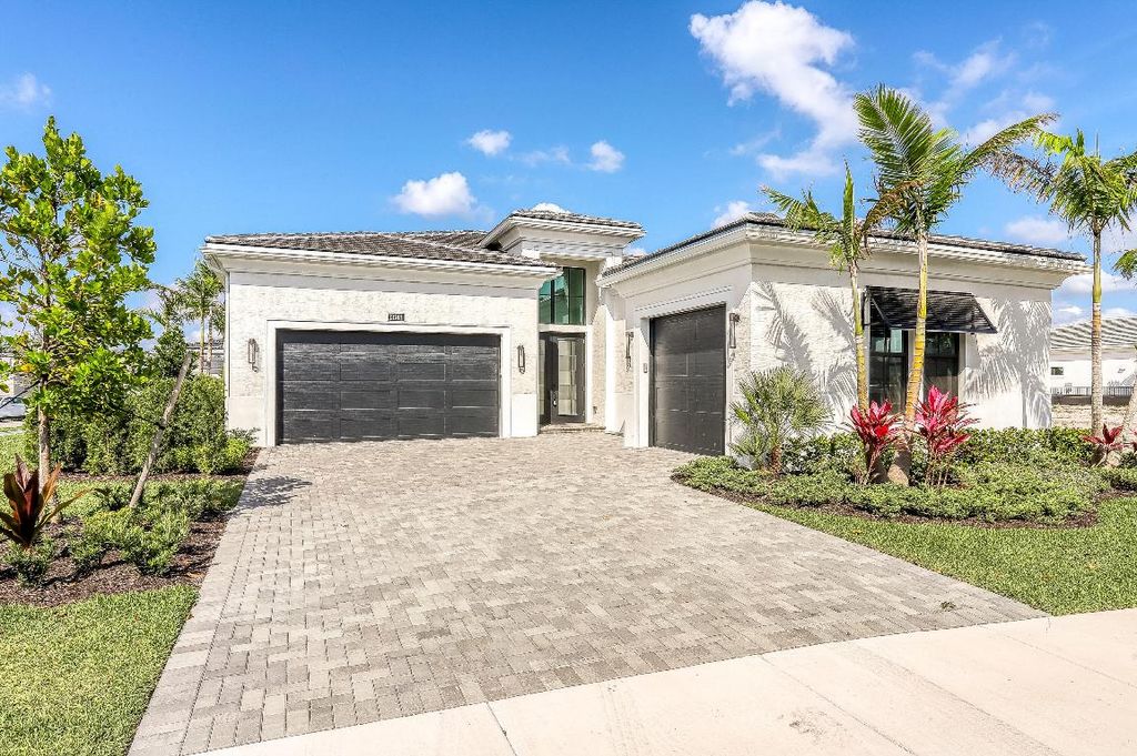 Photo of 13143 Artisan Circle, Palm Beach Gardens, FL 33418 (MLS # R10964797)