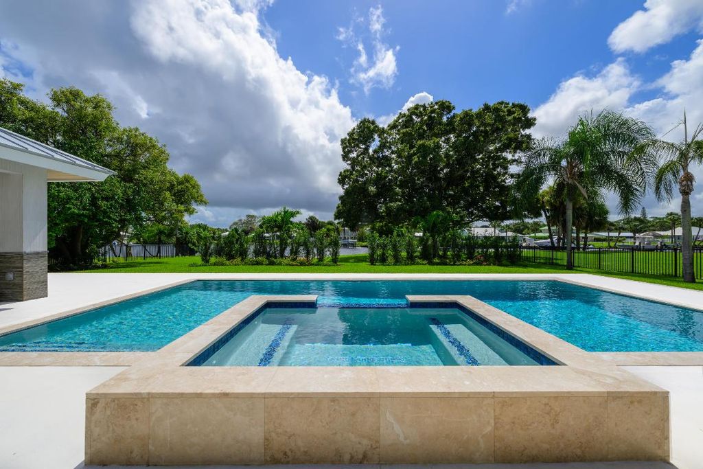 Photo of 1064 NW Spruce Ridge Drive, Stuart, FL 34994 (MLS # R11112930)