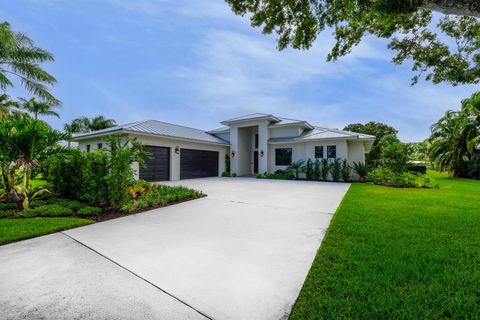 Photo of 1064 NW Spruce Ridge Drive, Stuart, FL 34994 (MLS # R11112930)