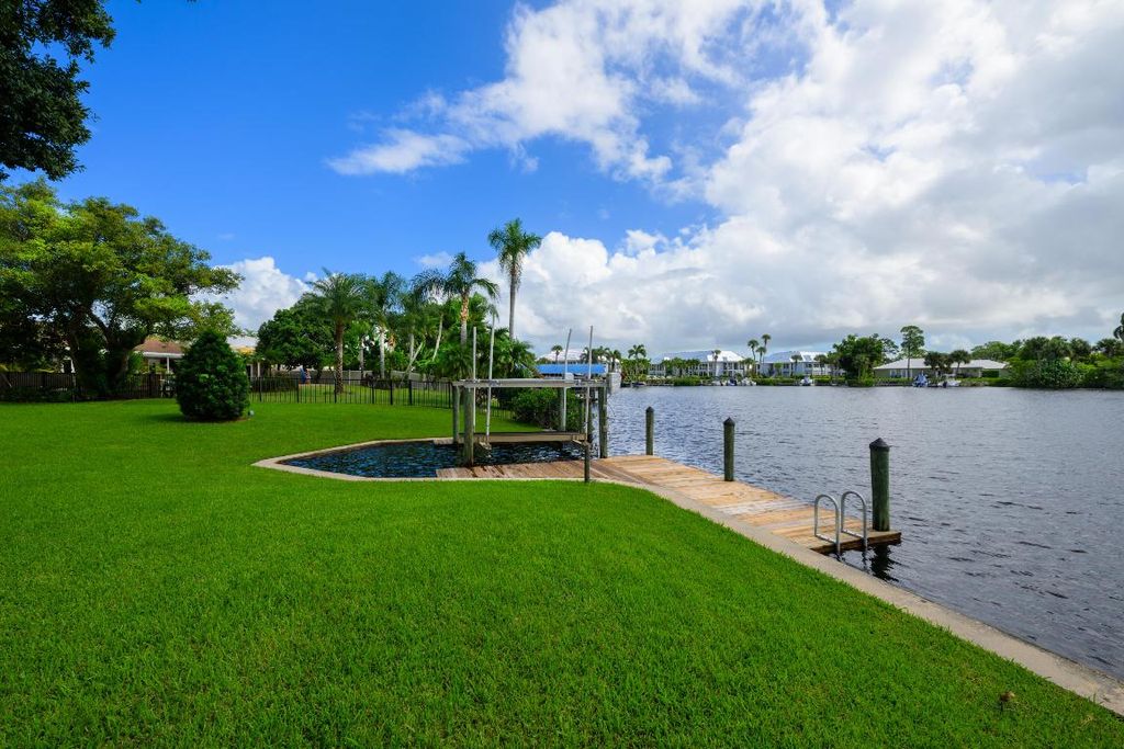 Photo of 1064 NW Spruce Ridge Drive, Stuart, FL 34994 (MLS # R11112930)
