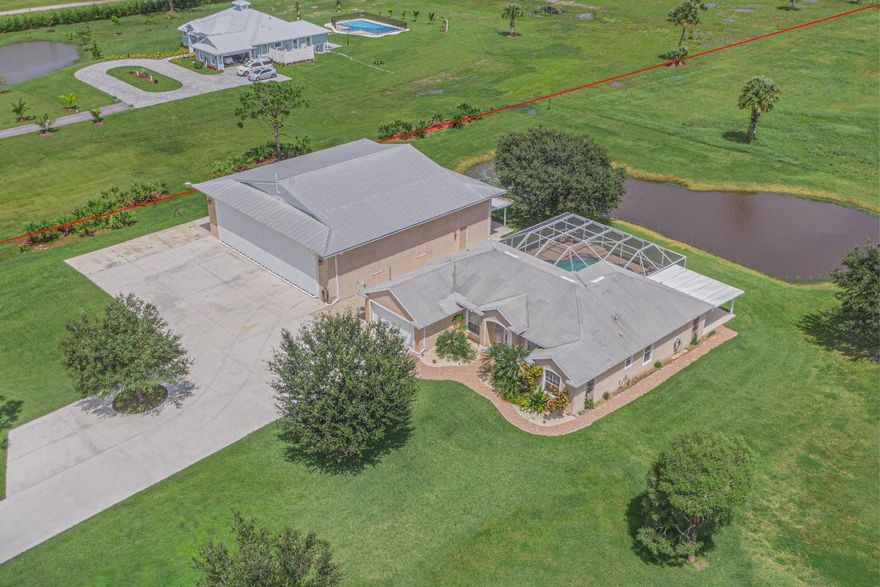 72 HOUR KICK OUT CLAUSE! Rare opportunity to own a house in a private Airpark Community with a 4,000 ft lighted runway.  This well maintained 4/3 + den CBS pool home sits on just under 5 acres with an amazing 60X60 AIR CONDITIONED Hangar, hydro swing hydraulic remote controlled door built in 2007 (14x50 door clearance)! Hangar also has a loft with room/sink/toilet. Perfect for the meticulous plane/car enthusiast.  Beautiful screened in pool overlooking a manicured pond with abundance of wildlife.  Come enjoy peaceful living with the convenience to hop in your plane to your travel destination. *Please note, garage is converted to a game room, easily converted back to original 2 car garage.***HOA conditionally approved paving runway and discussing with engineers to keep part grass!
